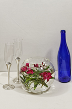 Red Oleander and two Glasses and a Cobalt Wine Bottle